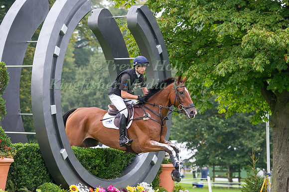 Harry Dzenis (GBR) riding Dromgurrihy Blue competing in the Cross Country Phase