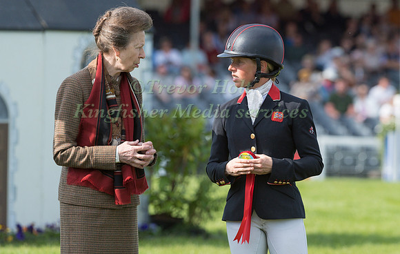 Ros Canter  recieving  Her rosette from the Princess Royal