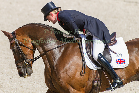 Piggy French riding Jakata taking part in the dressage test
