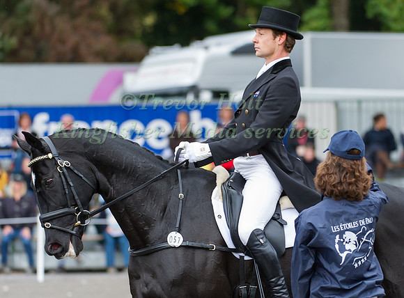 Christopher Burton and Underdiscussion entering the Dressage Arena