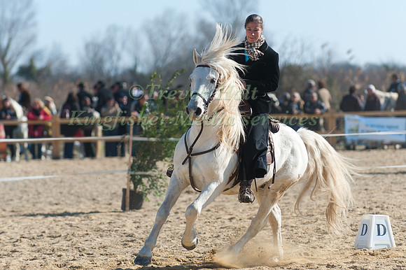 A rider performs her dressage test  at the Camagri