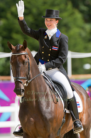 Nina Lamsan Ligon Waves to the Crowd after completing her dressage test