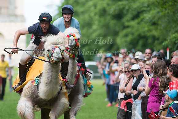 ANDREAS OSTHOLT  AND HILARY MANNERS TAKE PART IN THE CAMEL RACING AT THE 2017 HOUGHTON INTERNATIONAL HORSE TRIALS