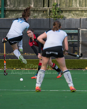 Nicki Moss of Clifton Jumps to avoid a shot from Bowdons Sian Fr