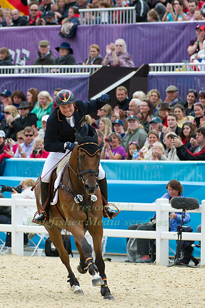 Michael Young Olympic Double Gold Medalist celebrates his winning round