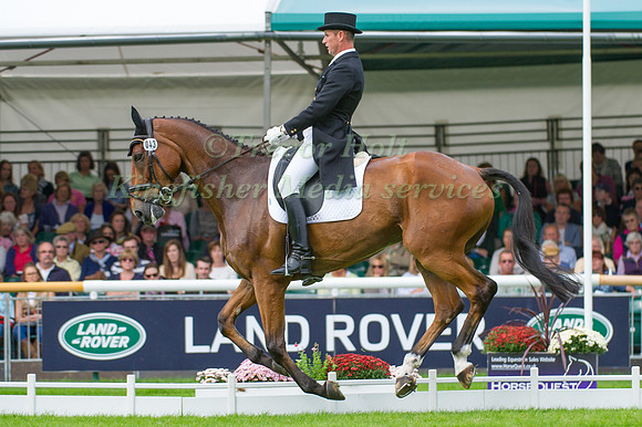 Gordon Murphy (GBR) riding Imperial competing in the dressage test