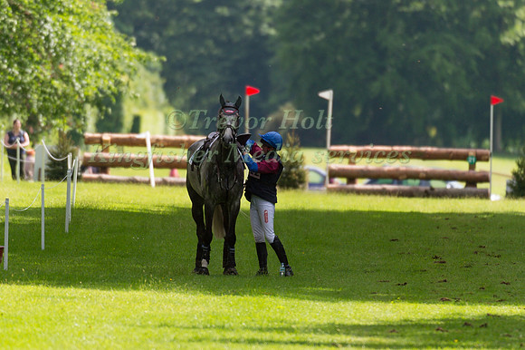 HANNAH BATE (GBR) AND CAPITAL T HELD ON COURSE