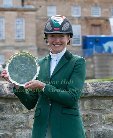 Aoife Clark Holding the Sugden Trophey in front of Bramham House