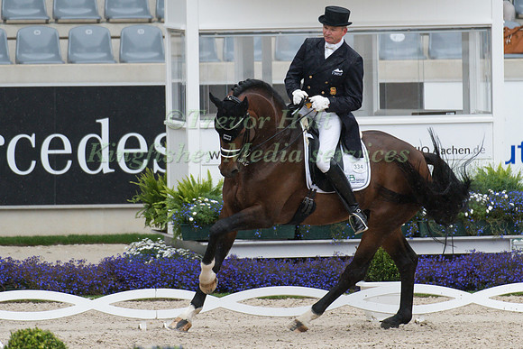 Hubertus Schmidt (GER) and Escolar taking part in the Prize of VUV - Vereinigte Unternehmerverbände Aachen Prix St. Georges CDI4*