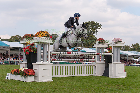 Harry Dzenis (GBR) riding Xam taking part in the Show Jumping Phase