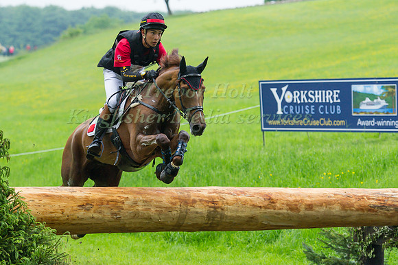 Alex Hua Tian (CHN) riding Don Geniro