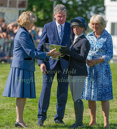 Rosalind Canter receiving the Butler Bowl for best British rider, at the 2017 Mitsubishi Motors Horse Trials with the Duchess of Beaufort, Lance Bradley and the Duchess of Cornwall