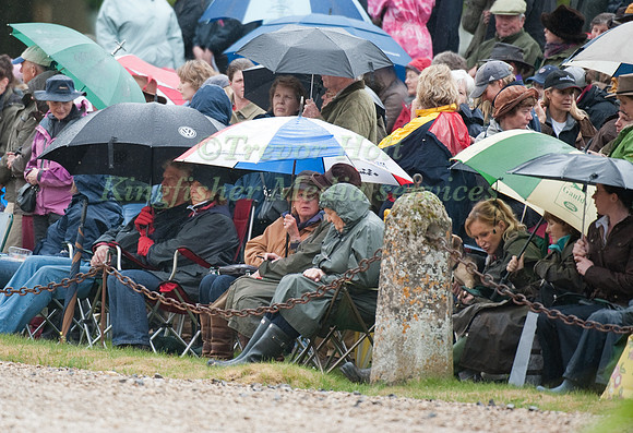 Spectators brave the rain for the trot up