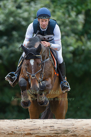 CHRISTOPHER  BURTON (AUS) RIDING FIRE FLY