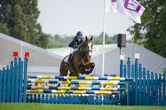 Louise Harwood (GBR) riding Mr Potts taking part in the Show Jumping Phase