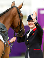 Zara Phillips waves to her family in the crowd