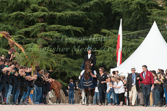 William Fox-Pitt Sea Cookie enter the arena to collect their trophy recieve their trophy