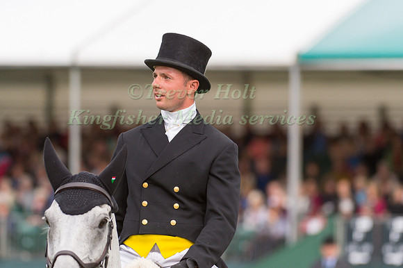 HARRY DZENIS (GBR) RIDING XAM