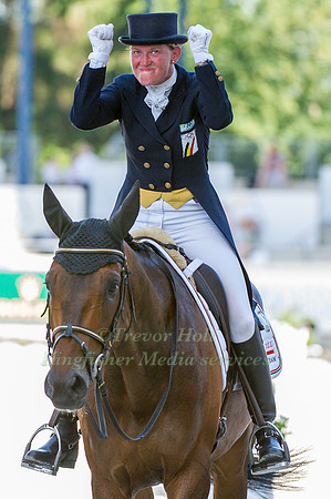 Karin Donckers riding Fletcha van 'T Verahof leaving the arena