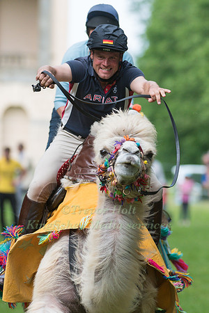 ANDREAS OSTHOLT  AND TAKES PART IN THE CAMEL RACING AT THE 2017 HOUGHTON INTERNATIONAL HORSE TRIALS