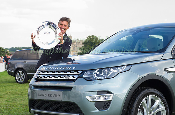 Andrew Nicholson in Front of Burghley House with the Land Rover Trophy at the Burghley Horse Trials on September 7, 2014 in Stamford, England.