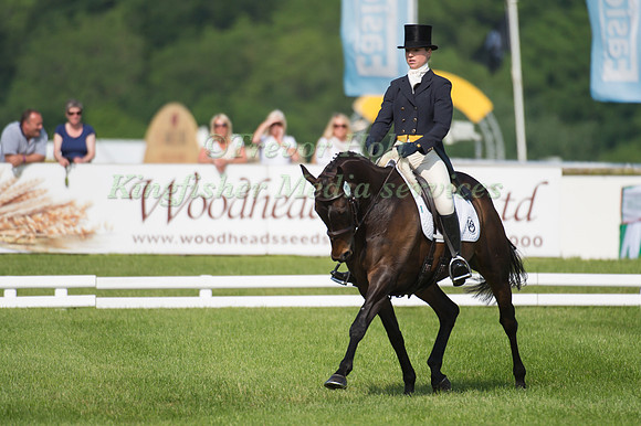 Sophie Platt (GBR) riding Be Be III