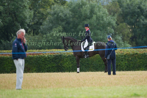 Nicola Wilson and Opposition Buzz in the Dressage warm up arena with Tracey  Robinson