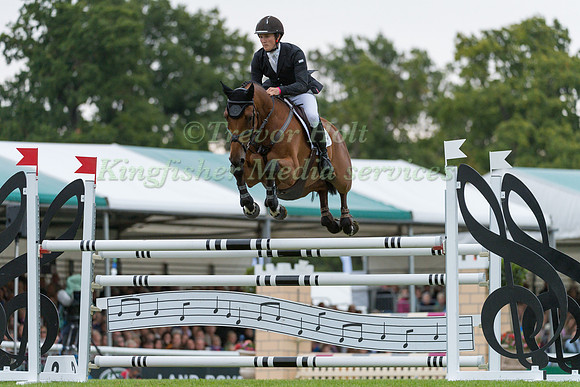 Tom McEwen (GBR) and Toledo De Kerser taking part in the Show Jumping  phase of the Land Rover Burghley Horse Trials 2017
