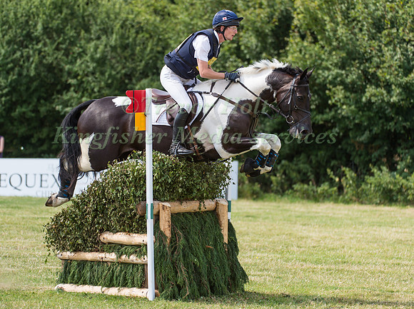 Paul Sims (GBR) riding Pebbly Wizard