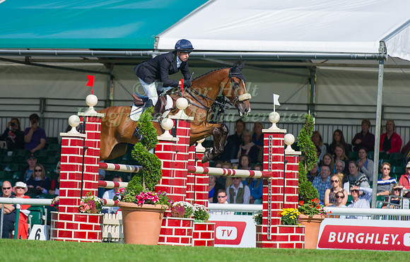 Harry Dzenis (GBR) riding Dromgurrihy Blue taking part in the Show Jumping Phase