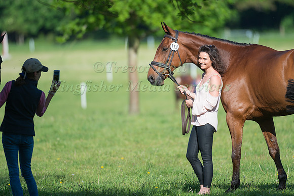 DAISY CHARLIER (GBR) AND ARCOS POSE FOR A PICTURE AT THE HORSE INSPECTION