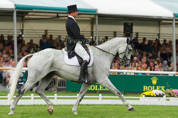 HARRY DZENIS (GBR) RIDING XAM