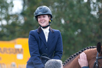 Emily Baldwin and Drivetime in the collecting ring after Jumping clear