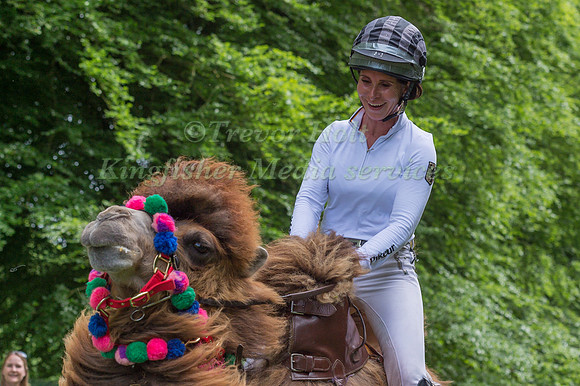 ANDREAS OSTHOLT  AND HILARY MANNERS TAKE PART IN THE CAMEL RACING AT THE 2017 HOUGHTON INTERNATIONAL HORSE TRIALS