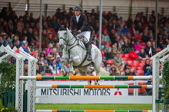 Harry Dzenis (GBR) riding Xam