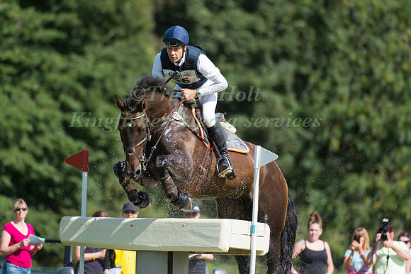 CHRISTOPHER  BURTON (AUS) RIDING CARIBA 15