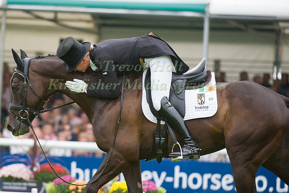 Aoife Clark (IRL) riding Vaguely North kissing and hugging her horse at the end of their test