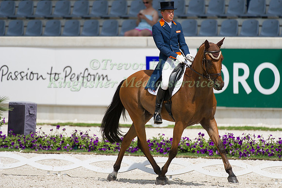 Tim Lips riding Concrex Oncarlos taking part in the dressage test