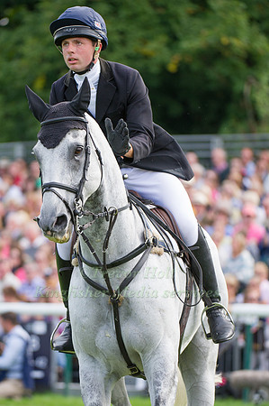 Harry Dzenis (GBR) riding Xam taking part in the Show Jumping Phase