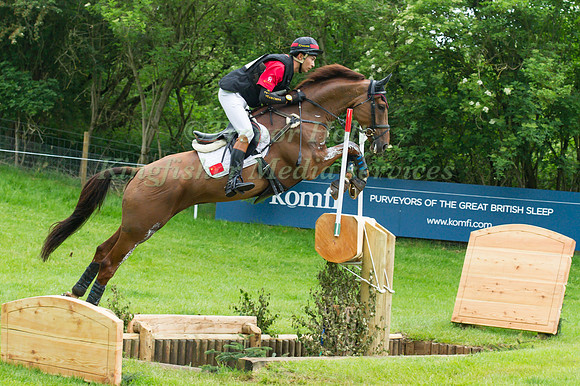 Alex Hua Tian (CHN) riding Don Geniro